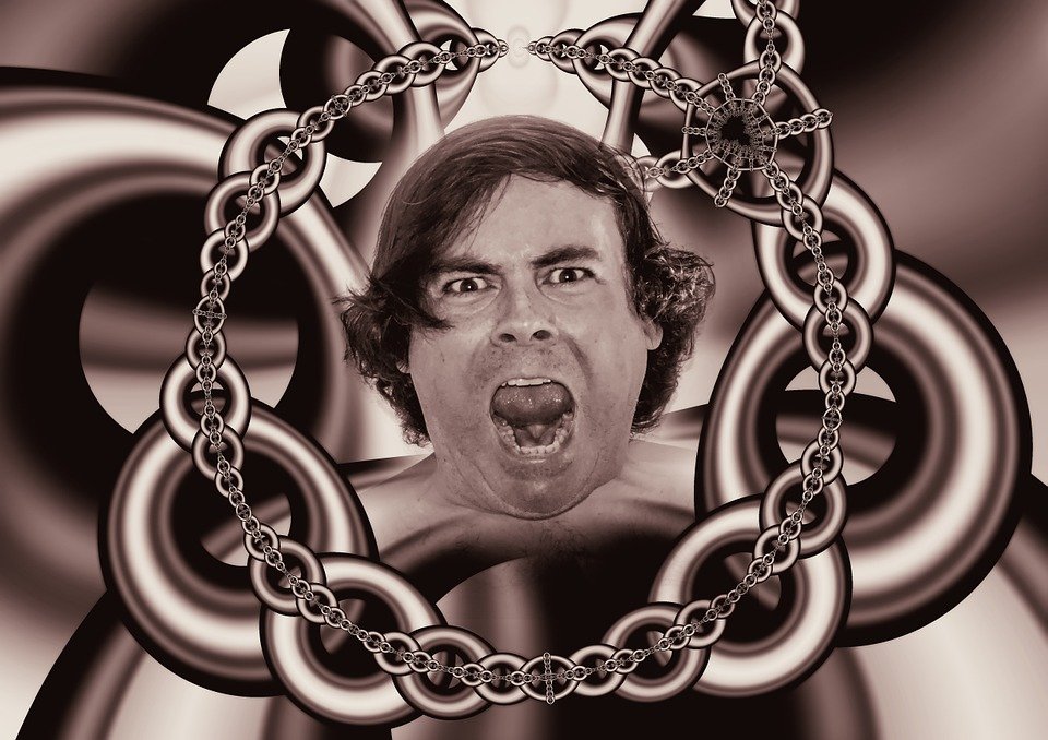 a bizarre dream of a man in chains